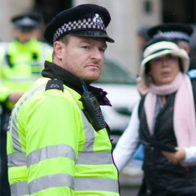 Police officer in crowd