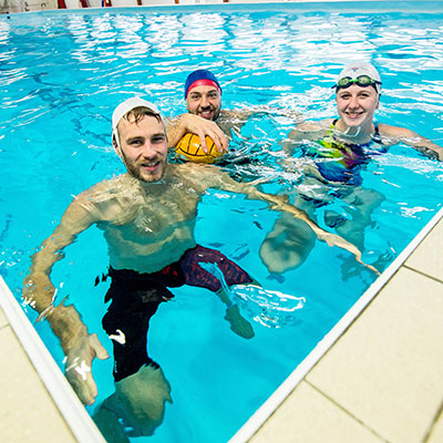 Sports Students in Swimming Pool