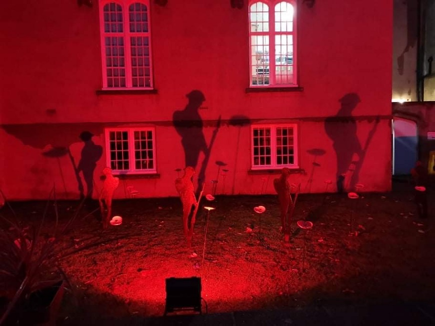 Image of Lampeter campus illuminated for Remembrance