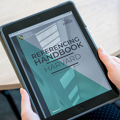 Tablet displaying Harvard Referencing Handbook