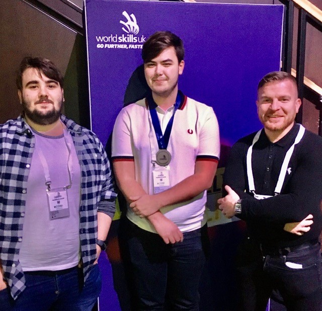 Zack Evans, who won a silver medal at WorldSkills in Birmingham, with Andrew and Gwyn